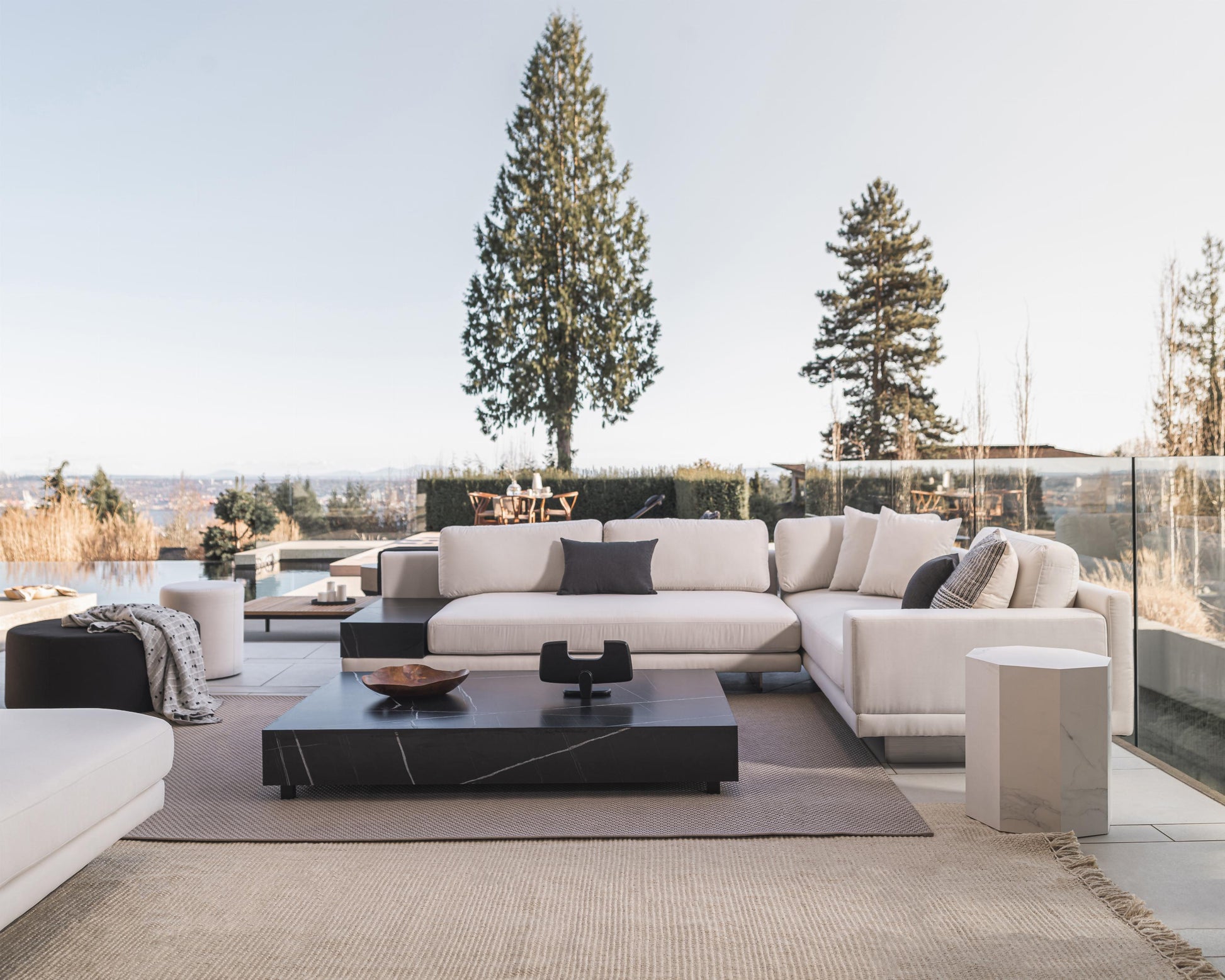 Outdoor Dresden Scene featuring Outdoor Liza Coffee Table in black ceramic