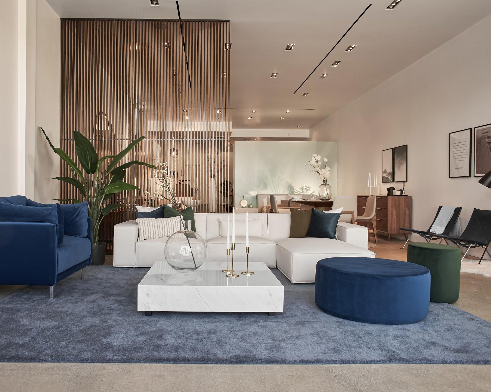 Nova poufs_ Featuring Porter Sectional and liza coffee table