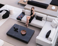 Dresden Outdoor Sectional Scene featuring Outdoor Liza Coffee Table and Nova Outdoor Poufs