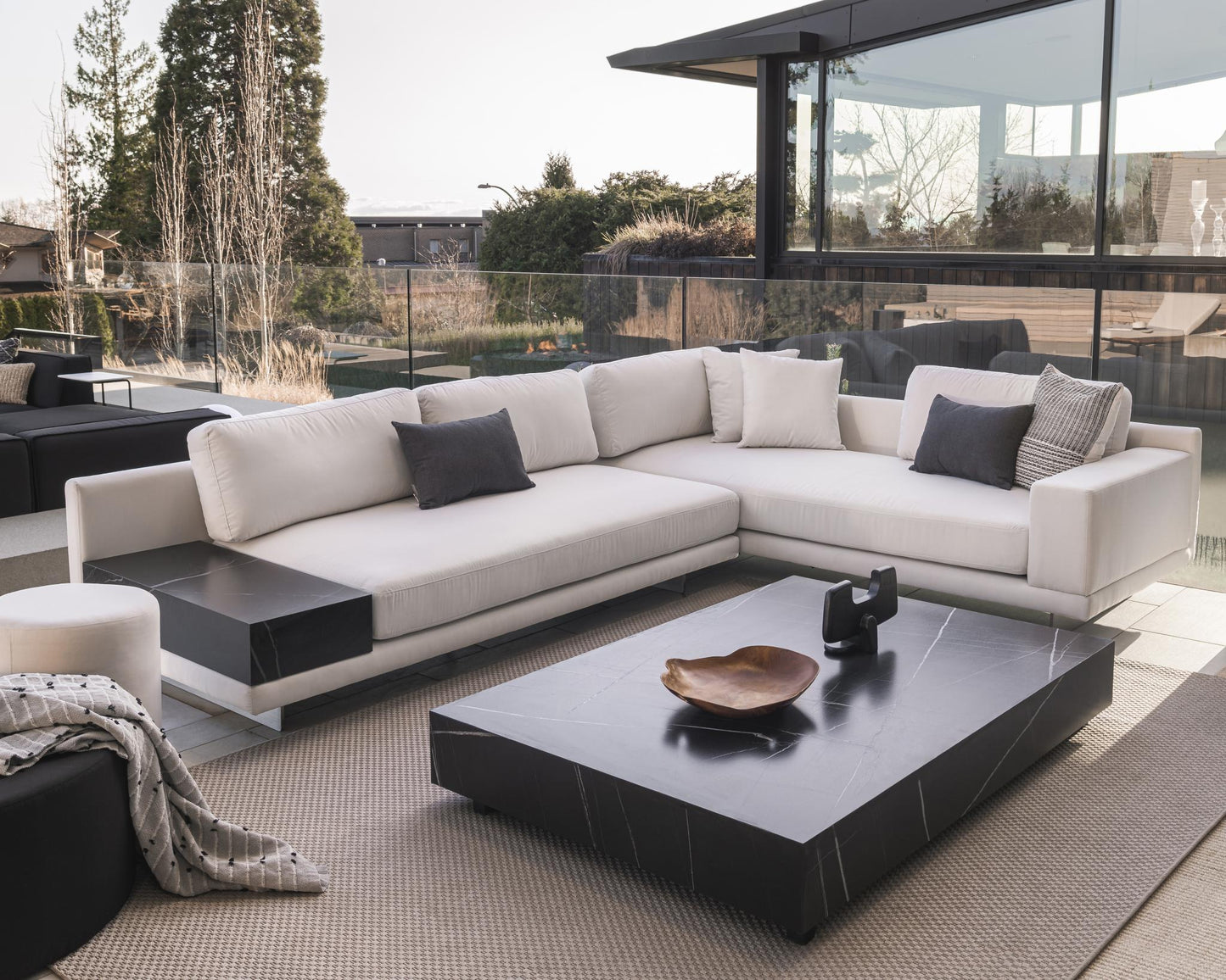 Dresden Outdoor Sectional Scene featuring Outdoor Liza Coffee Table and Nova Outdoor Poufs