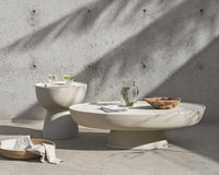 Maria Side Table and Coffee Table staged outdoors